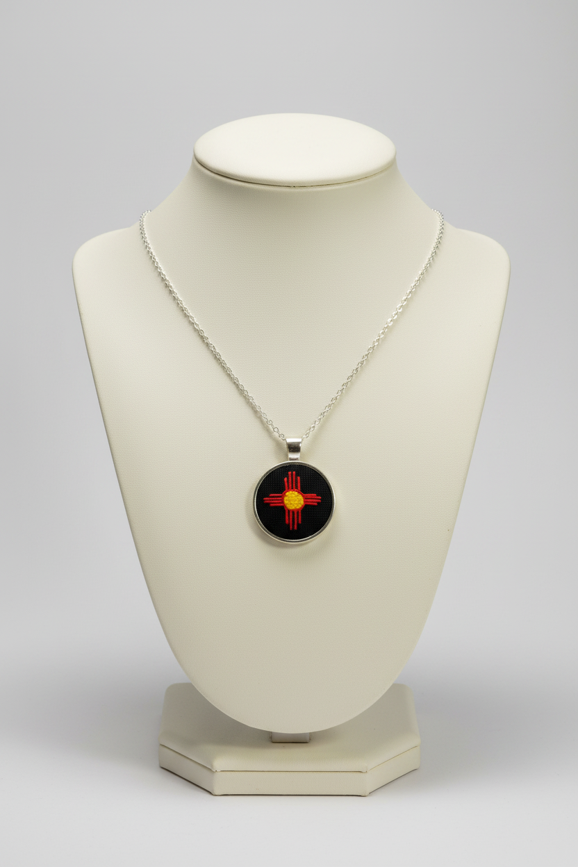 Zia Symbol Embroidered Silver Pendant (Red & Yellow)