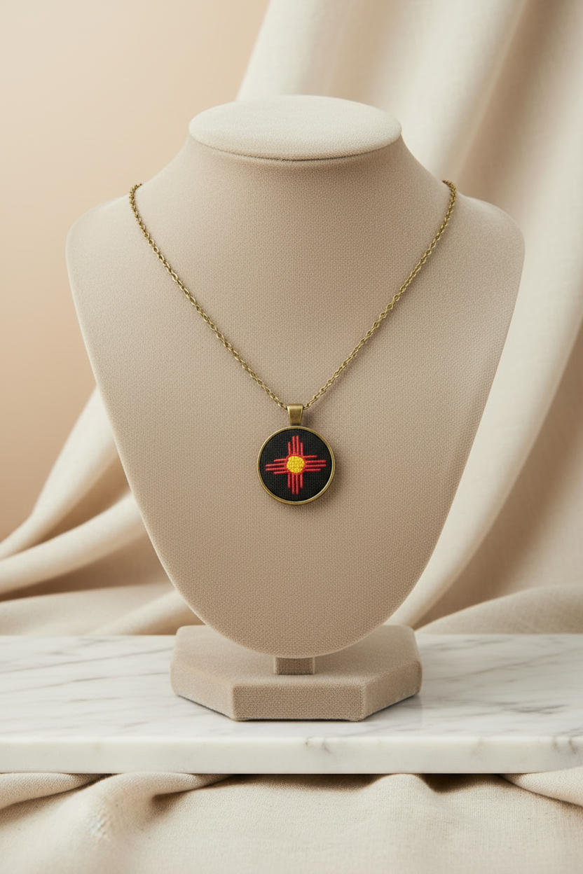 Zia Symbol Embroidered Bronze Pendant (Red & Yellow)